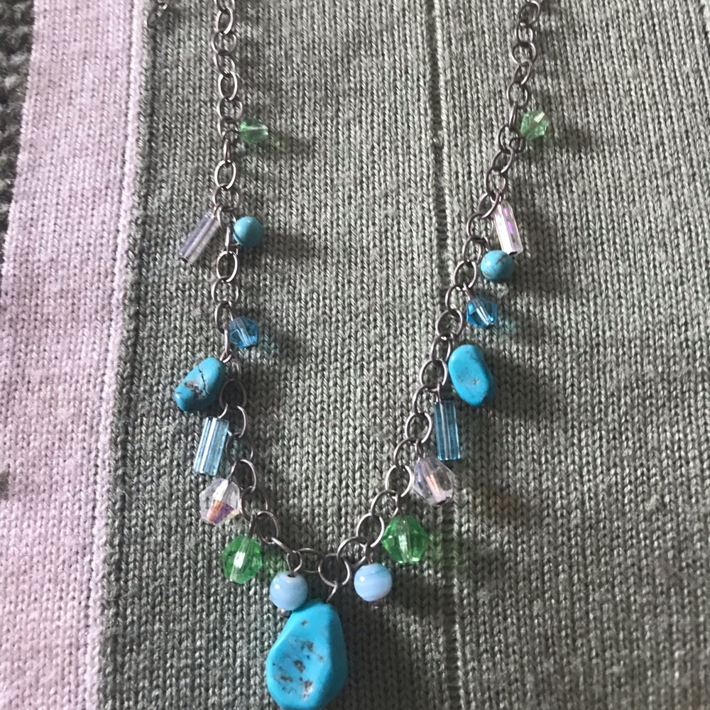 Sterling silver turquoise and colored beads.